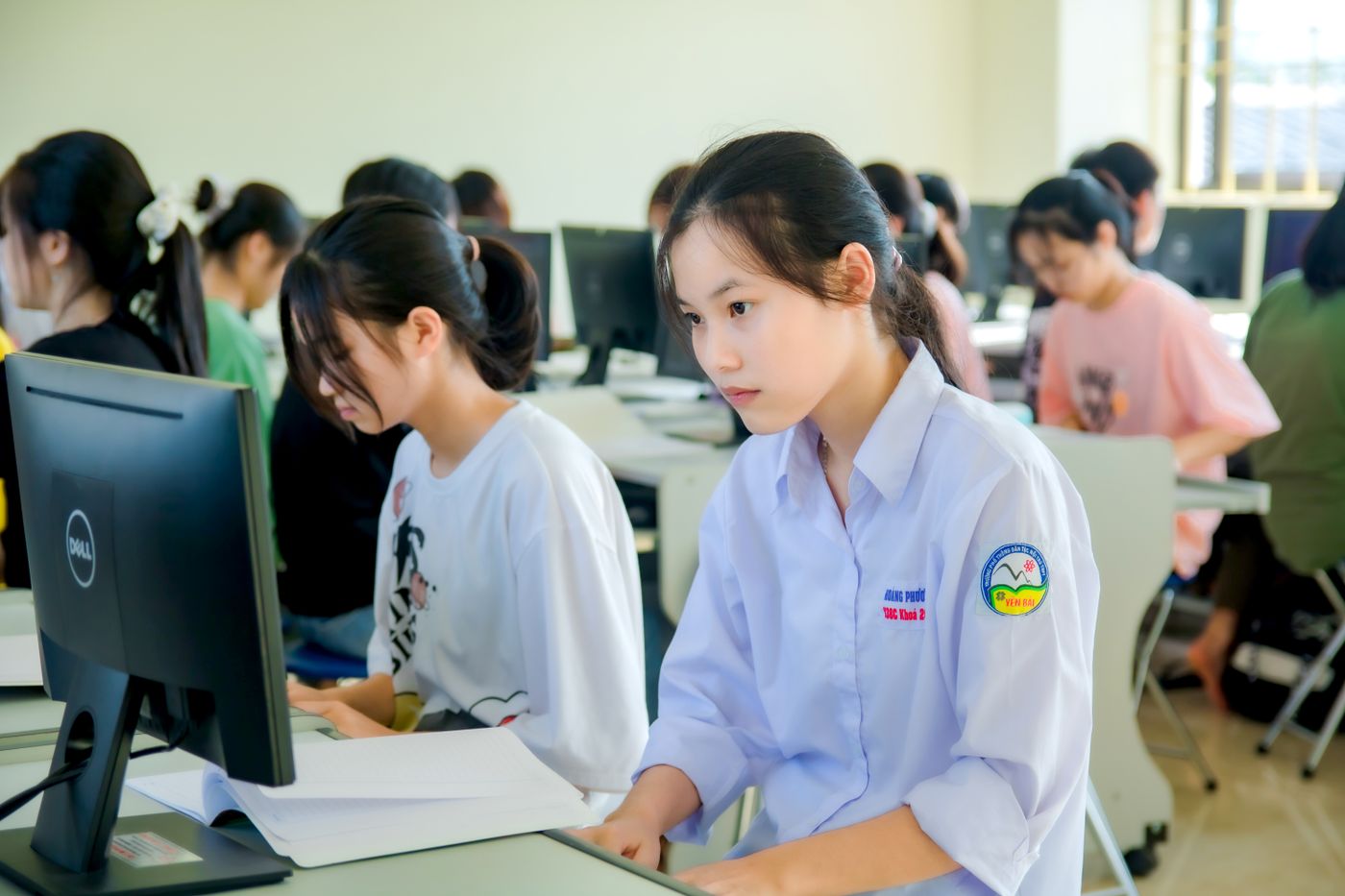 Students working on an exercise at their computers