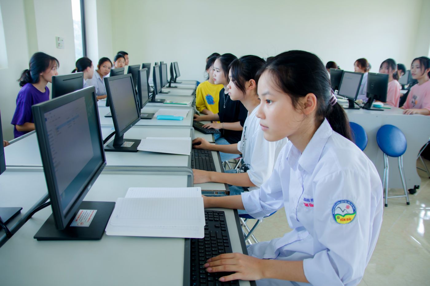 A student working at a computer in a lab